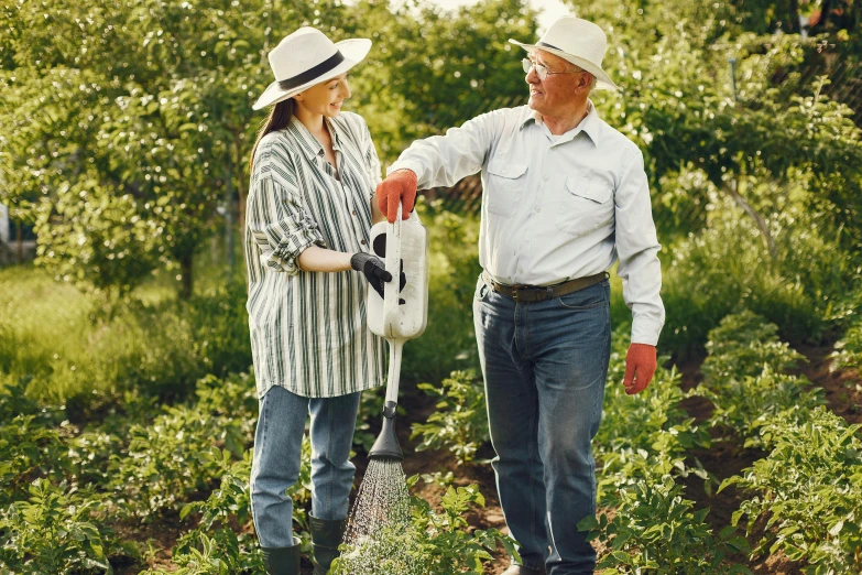 the older man is walking next to an old woman