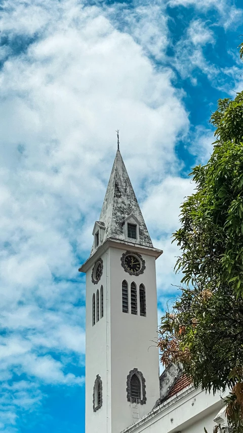 a very tall clock tower on top of a building