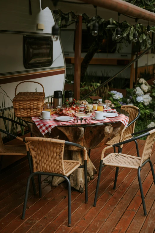 a table with many different chairs next to it