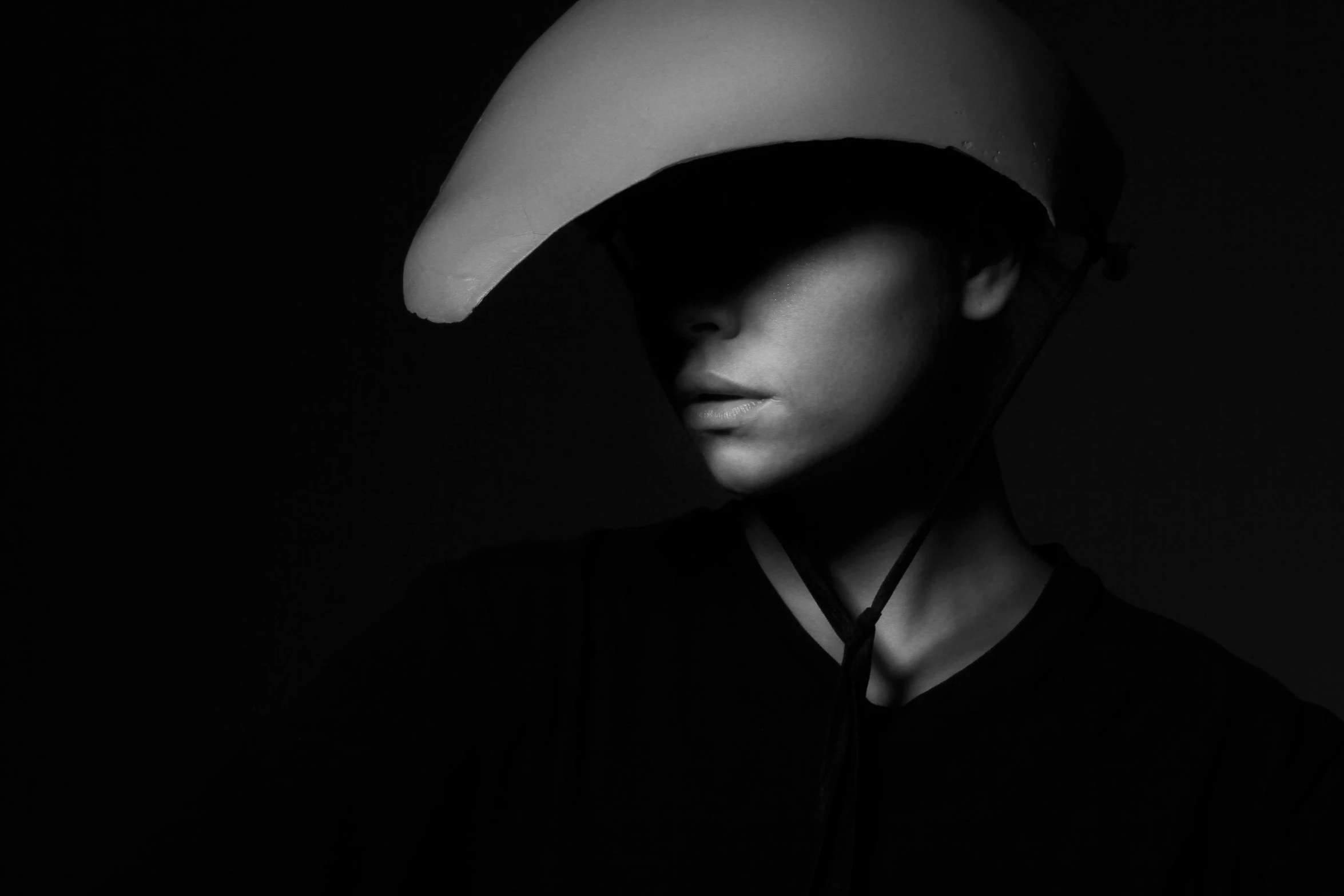 a woman wearing a helmet and posing for a po