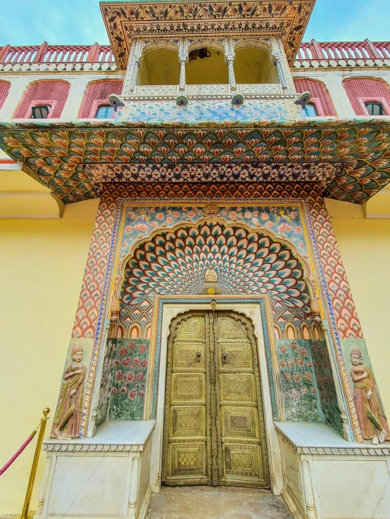 a big and colorful building with a wooden door