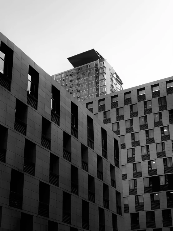 buildings with lots of windows and balconies in the sky