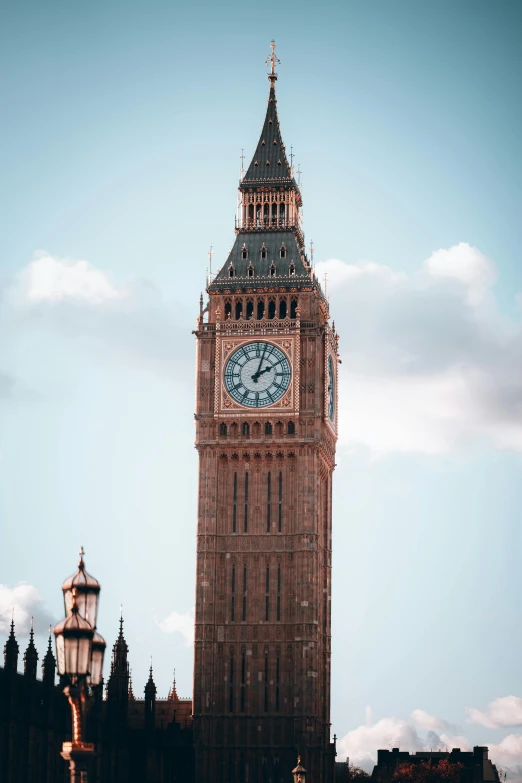 the big ben clock tower towering over the city of london