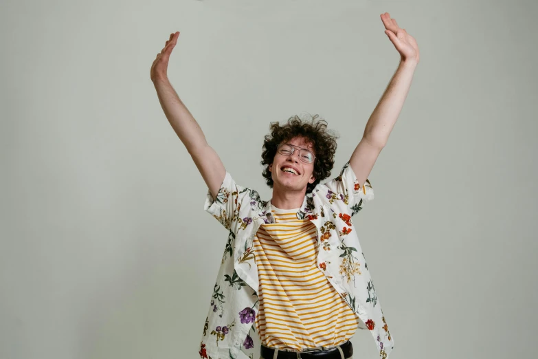 a person jumping up in the air to catch a flying object