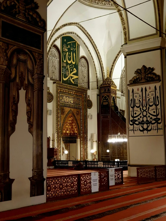 a po taken inside the interior of a mosque