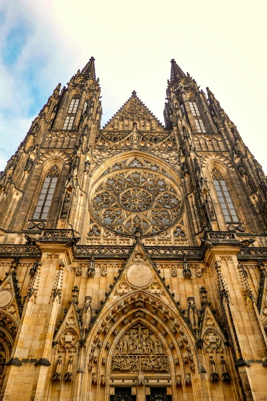 a large cathedral with a massive clock on the front