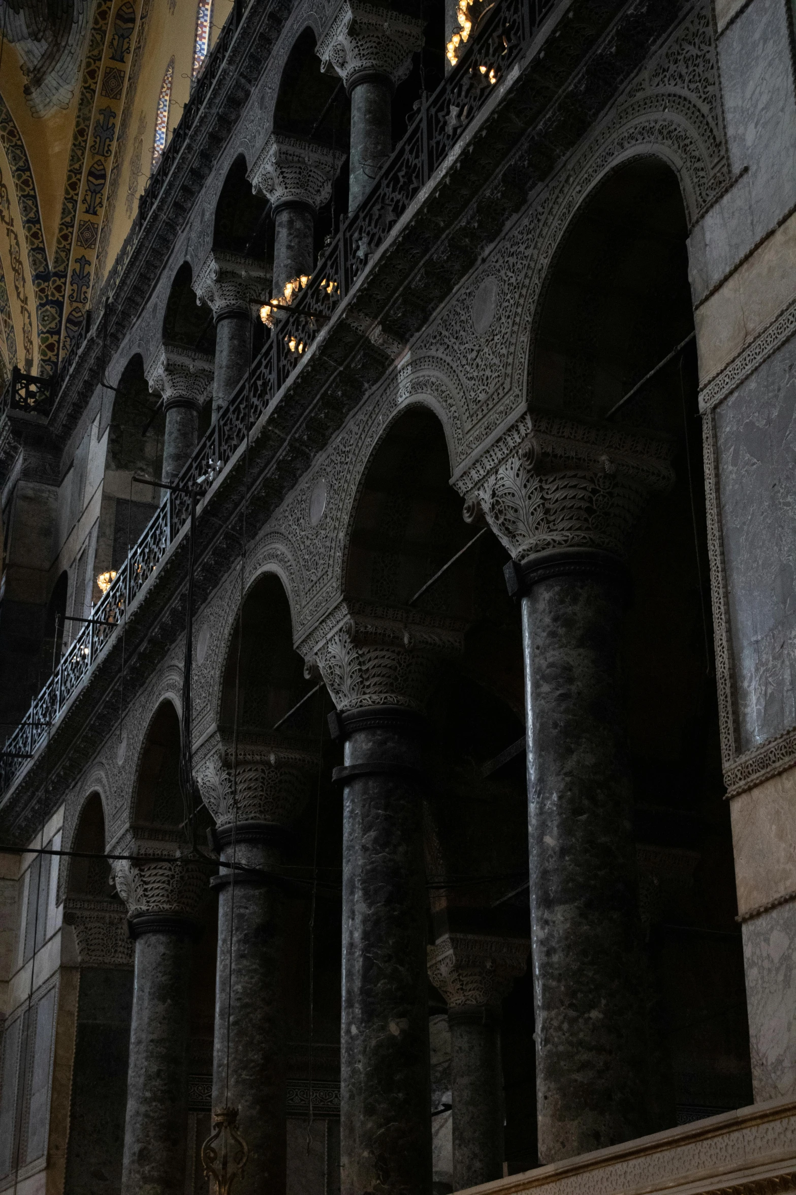 a couple of arches sitting inside of a stone building