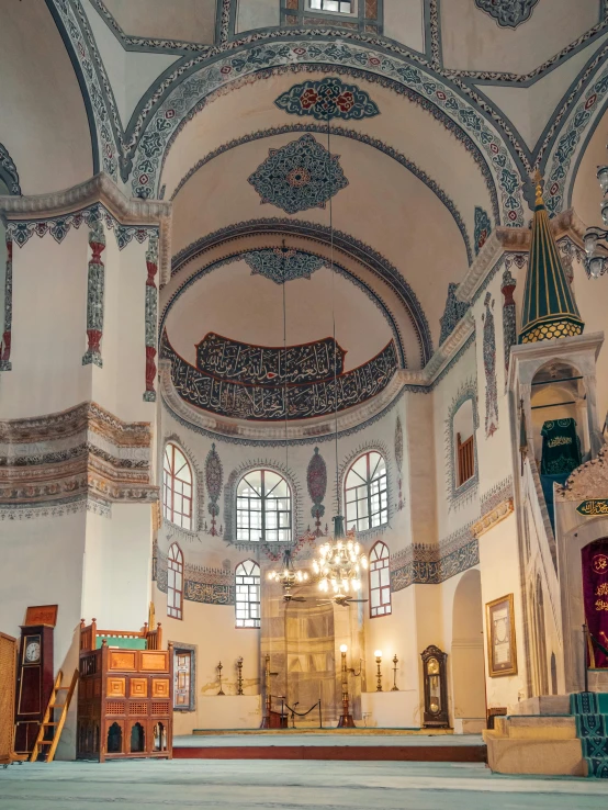 inside view of church with a large altar and high ceiling