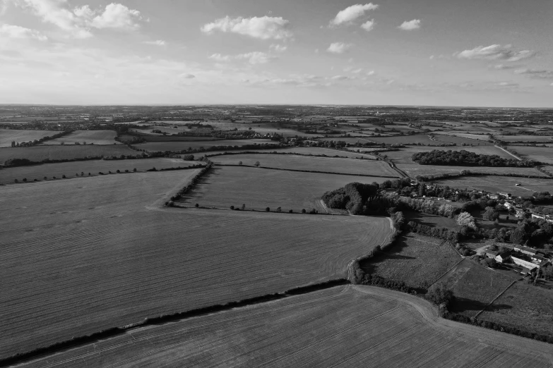 an aerial view of a country with many trees and houses