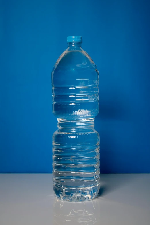 a bottle of water is placed on a table