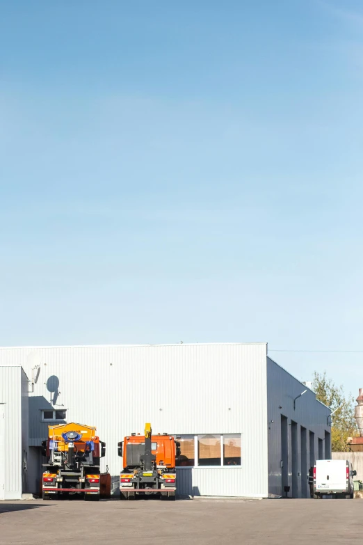 a garage is being worked on by a crane