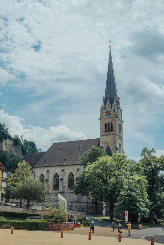 the tower on the old church has a steeple and steeple