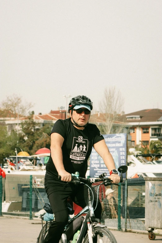 a young man on a bike in a city