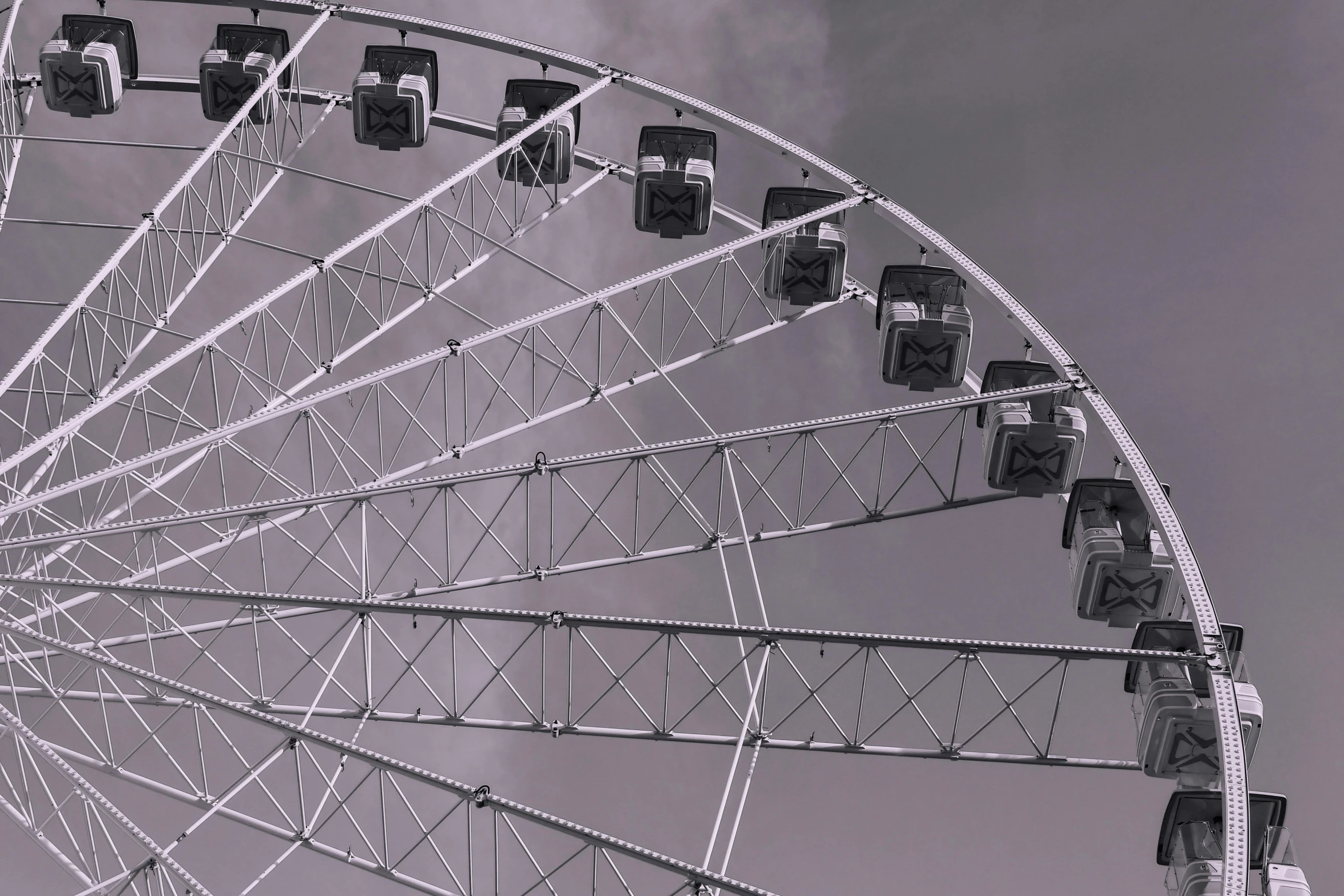 an amut park ferris wheel against a gray sky