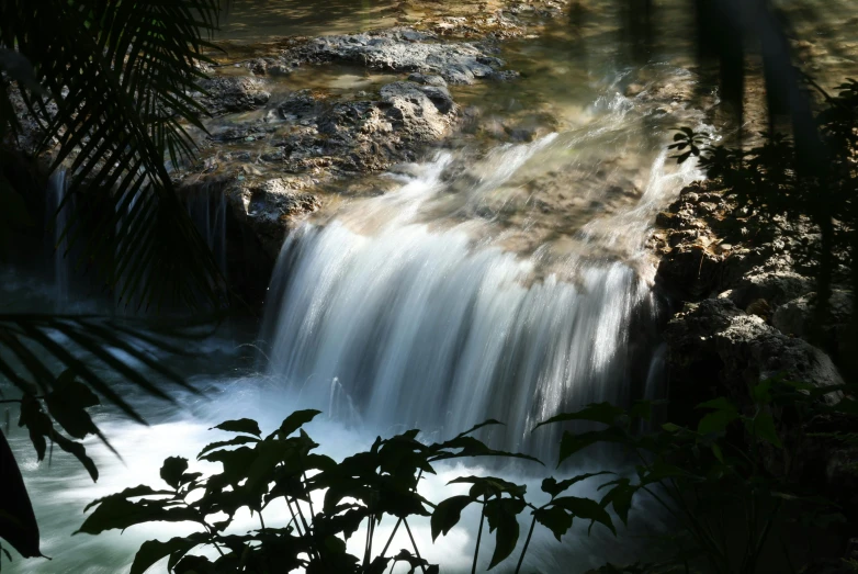 a waterfall with lots of water coming out of it