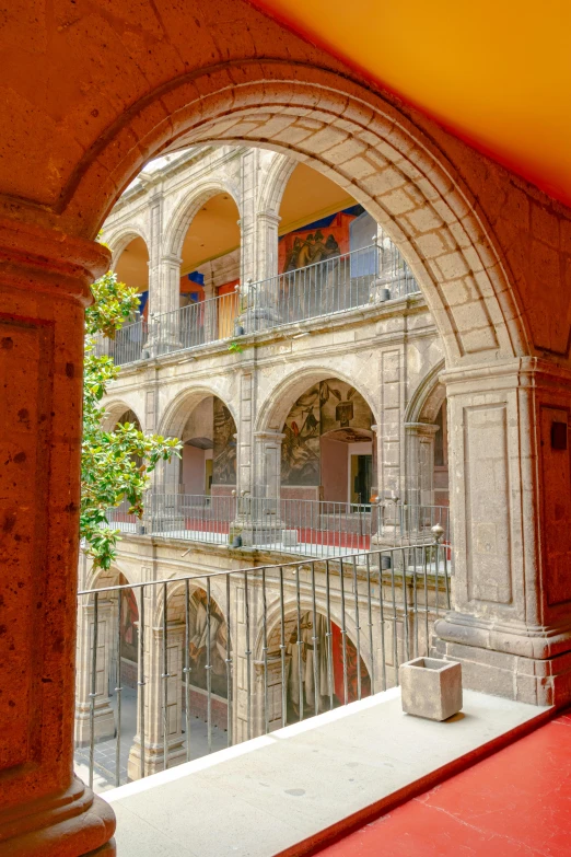 an arched archway in front of a building