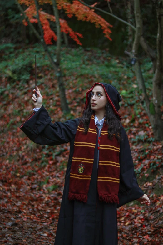 woman in harry potter costume standing on path