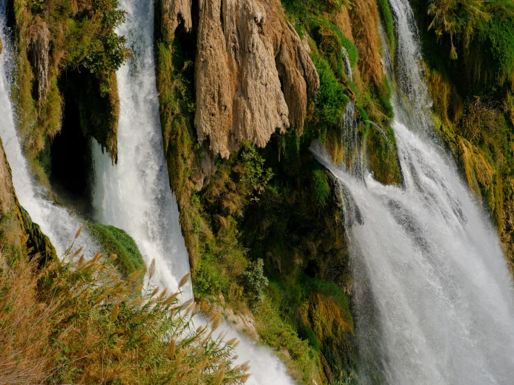 an aerial po shows two small waterfalls and a waterfall