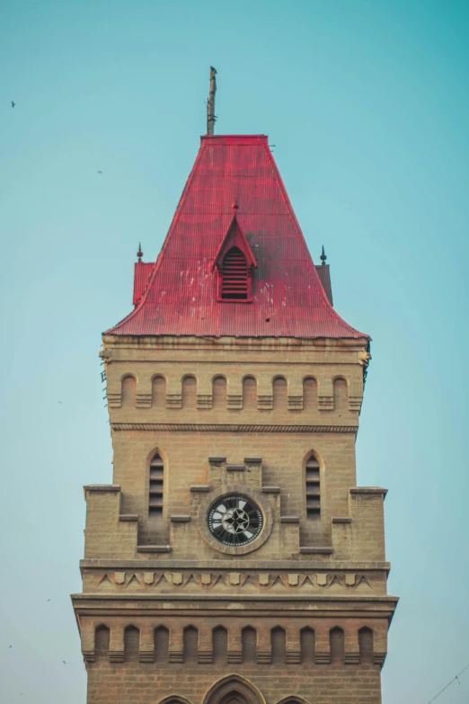 a tall building with a clock on the front of it