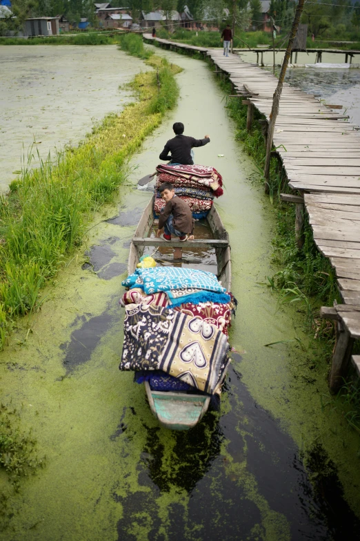 an image of boat with luggage in the water