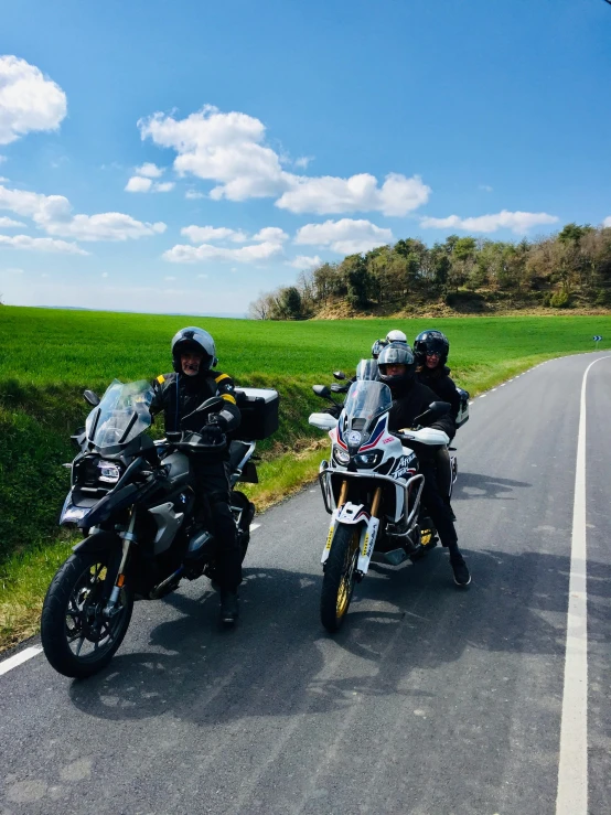 two people on motorcycles are taking a ride