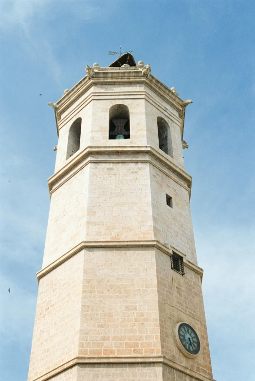 a tall tower with a clock displayed at the top