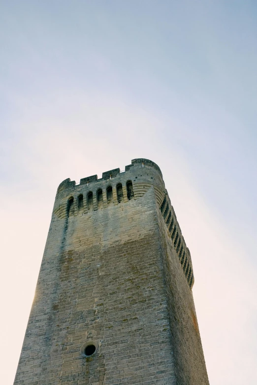 there is an old tower with a clock on it