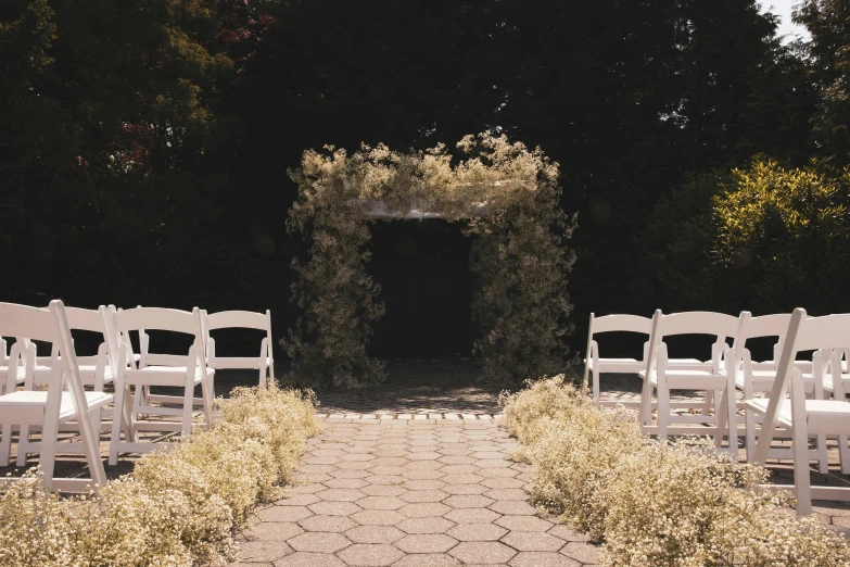 the back of a set of white chairs