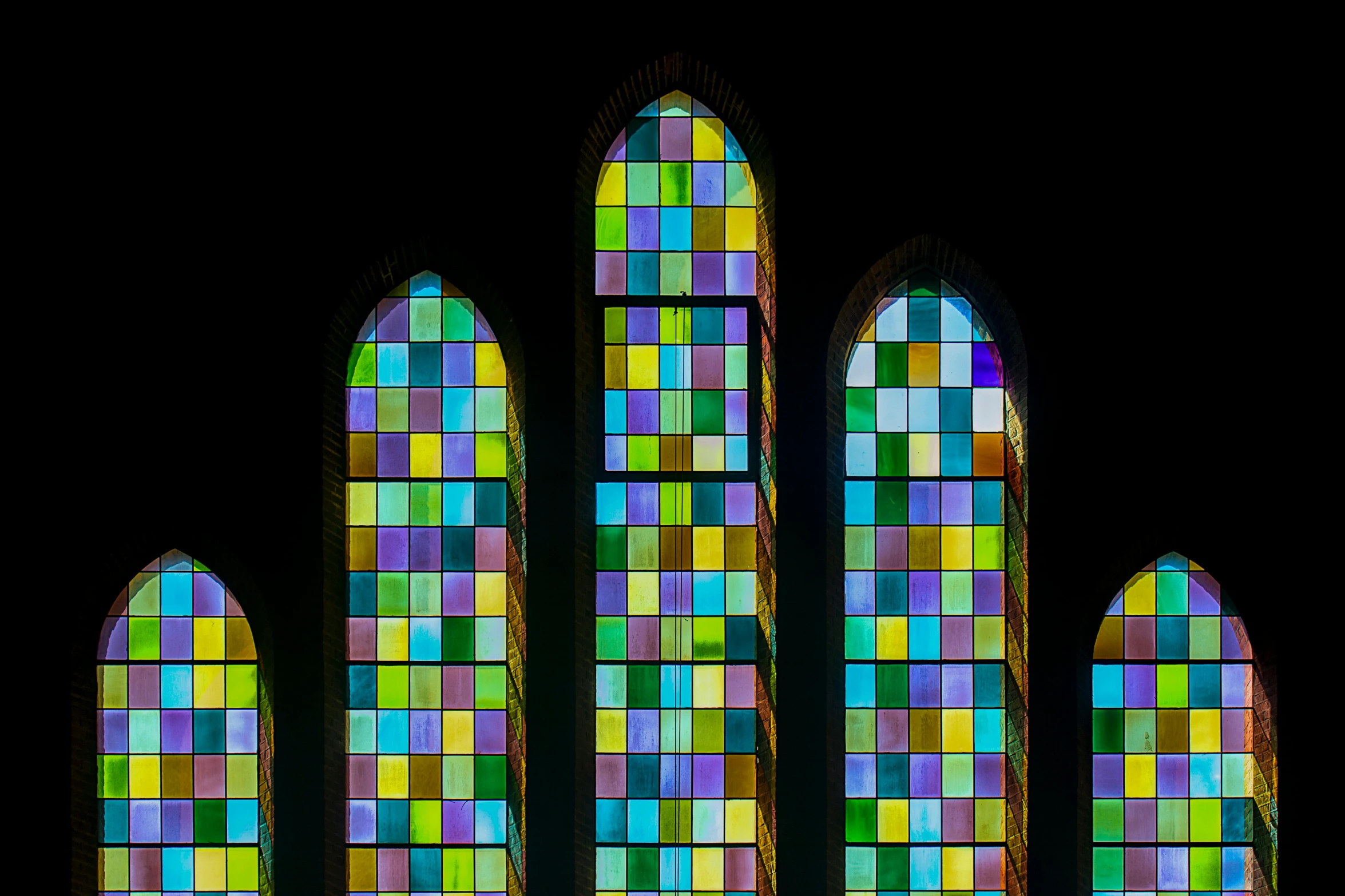 multiple colored windows with several windows reflecting different shapes