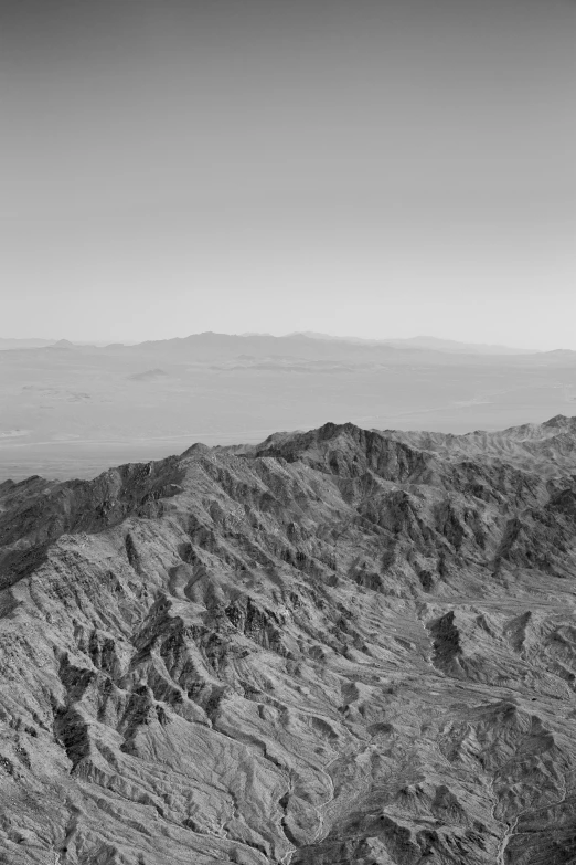 the view over the mountains of a distant valley