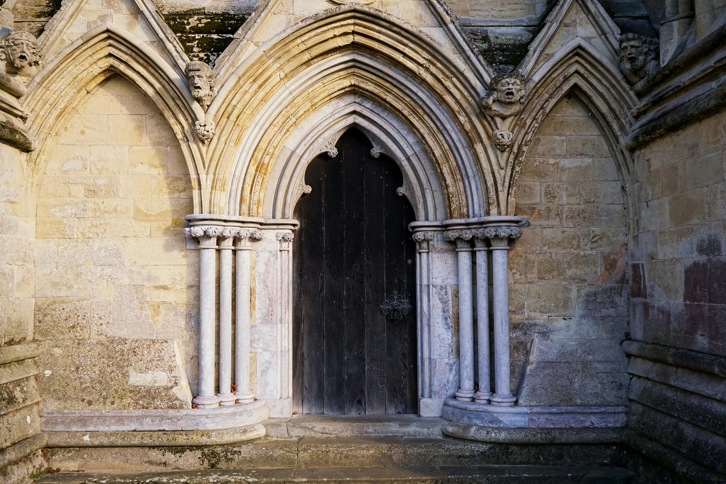 an empty door in the front of a large building