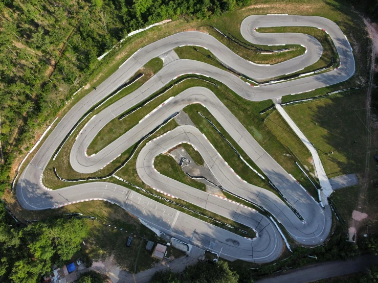 an aerial s of several roads curved up into the sky