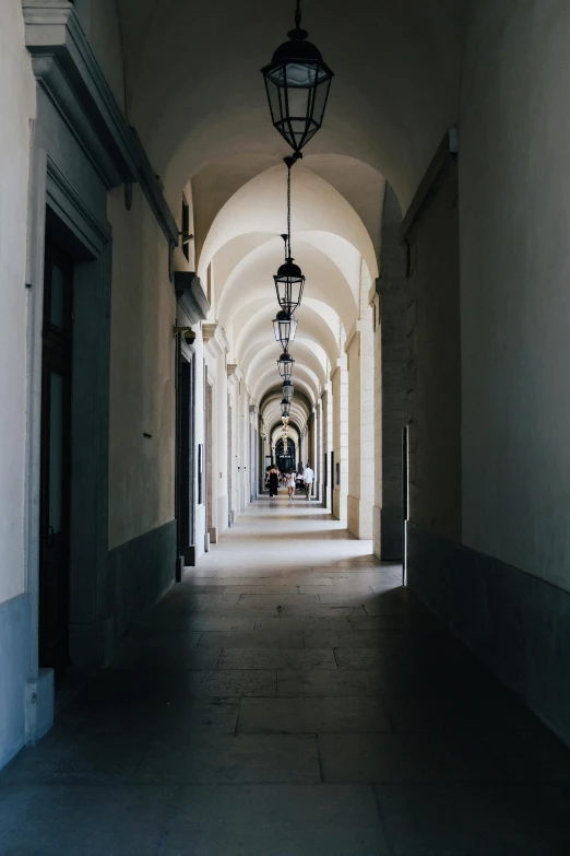 the light shines on the corridor near a door