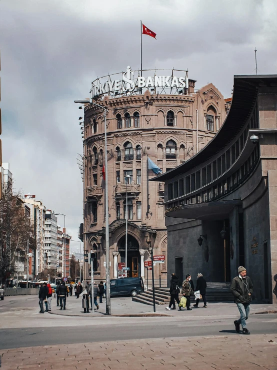 a very big old looking building that is on the side of the street