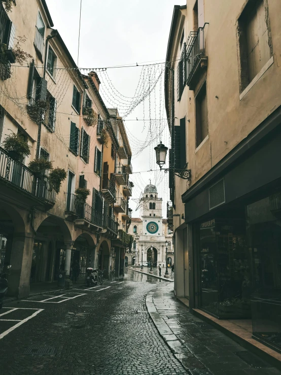 a narrow road with buildings on both sides