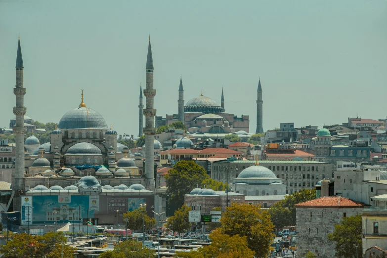 the view of a huge city with very tall buildings