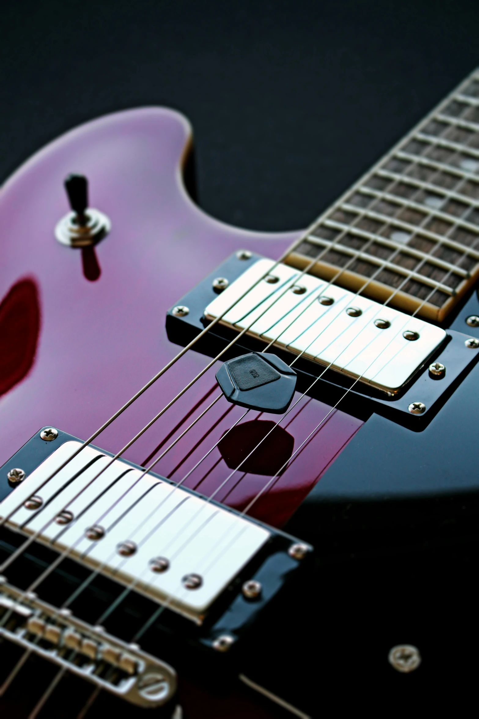 an electric guitar has a nice color and hardware