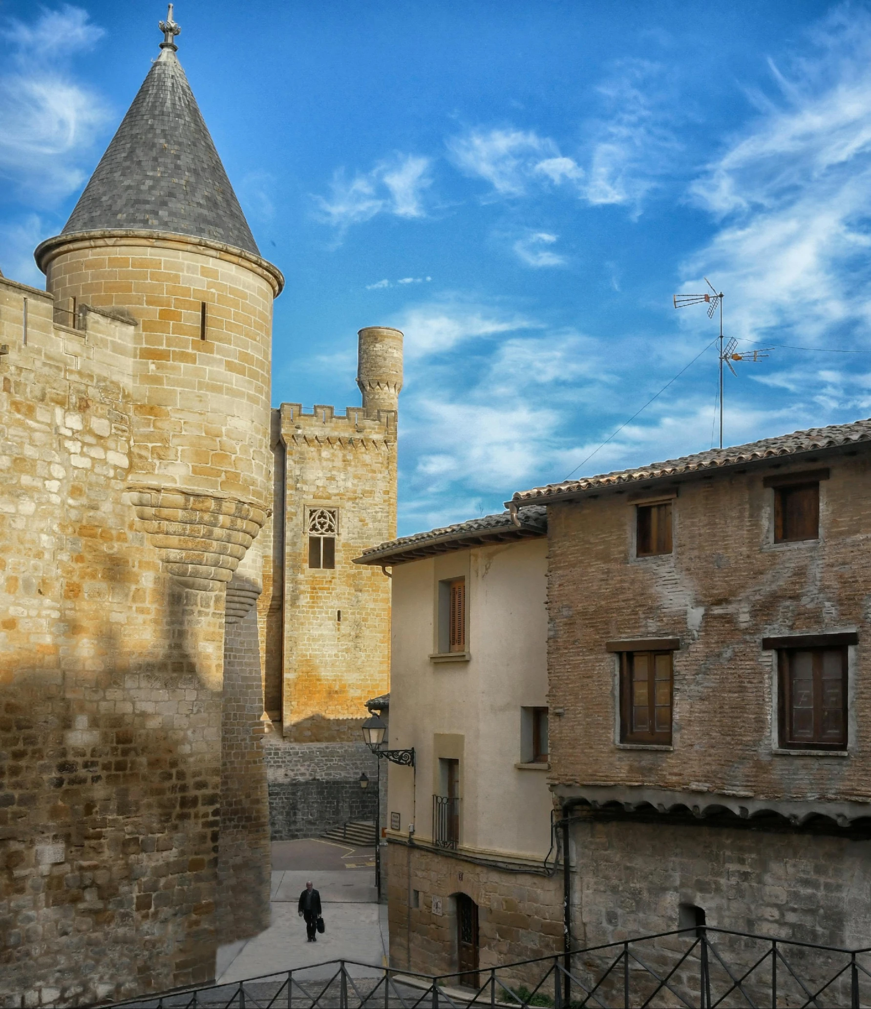 the old buildings are lined with stone and brick