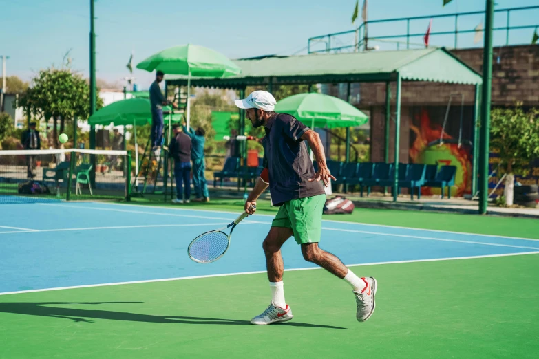 an older man on the tennis court