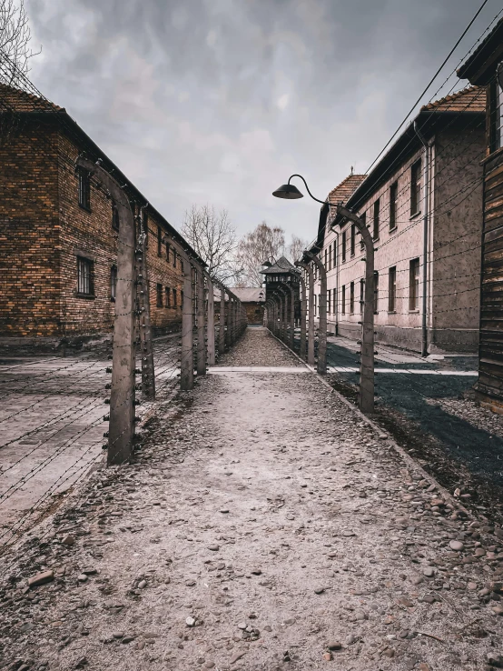 a long narrow road lined with brick buildings