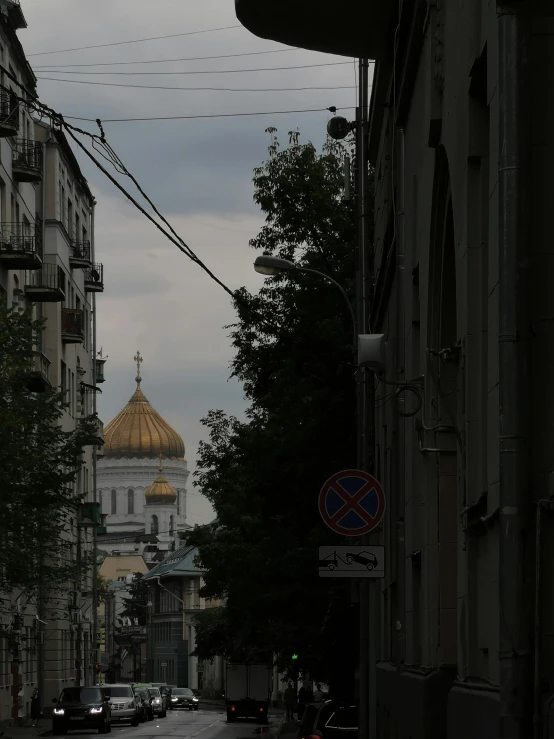 the back streets of an old city with steeples