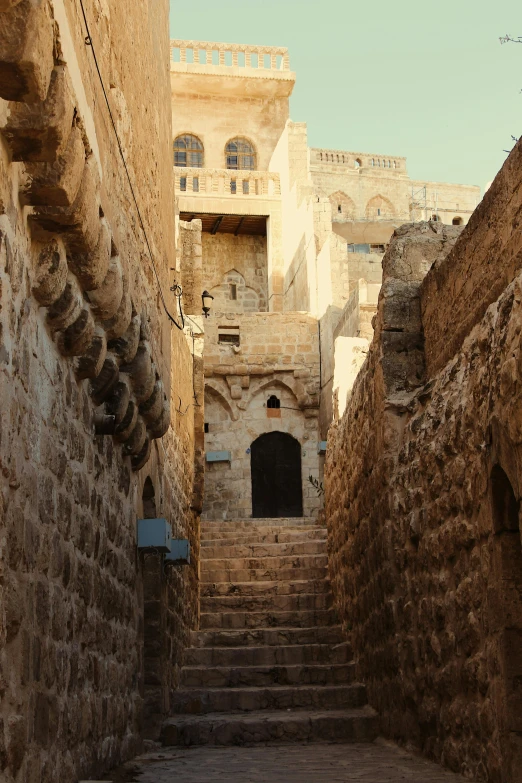 a stone street with many steps leading to it