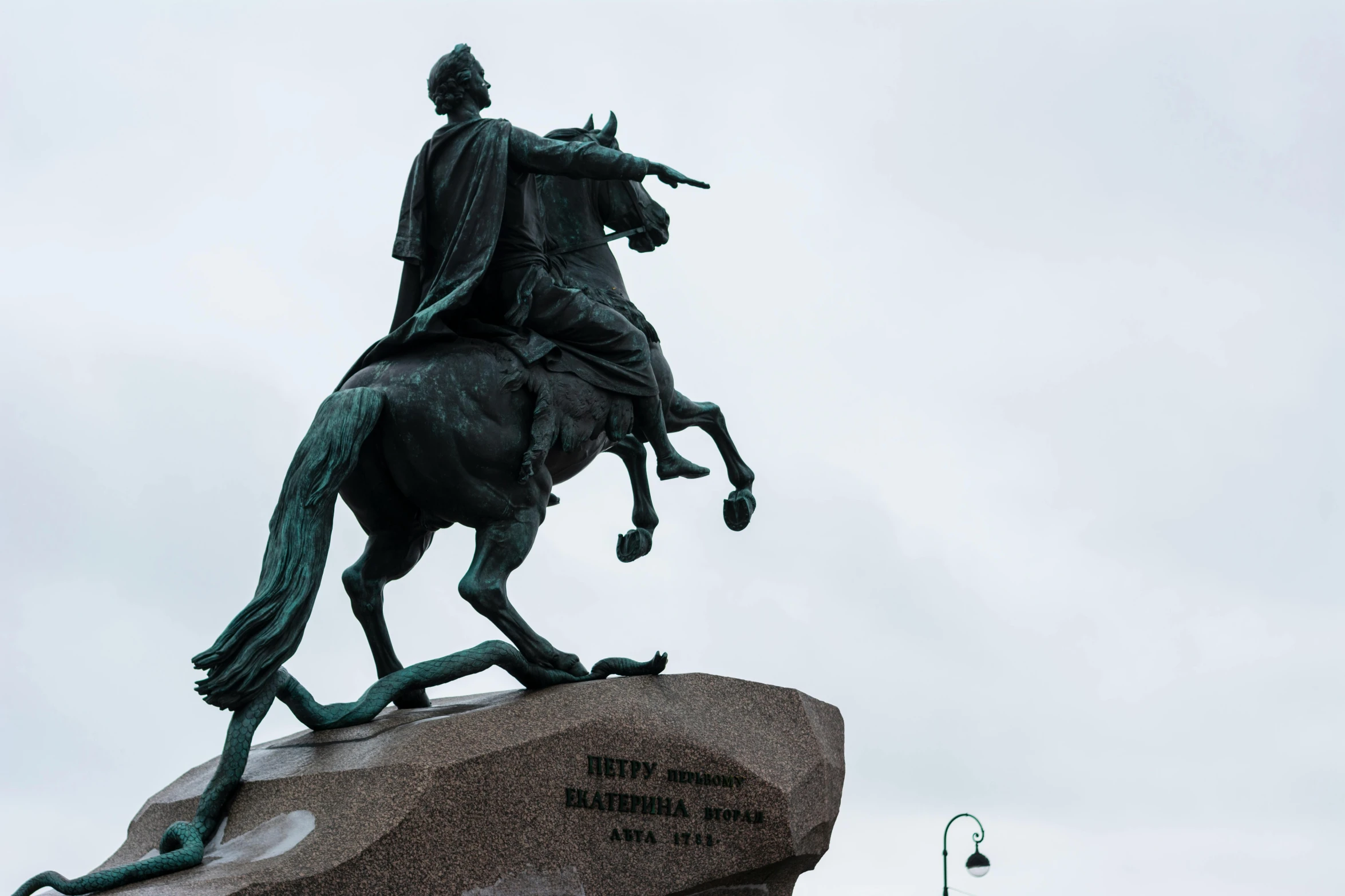 a statue of a man on a horse is shown