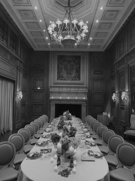 there is a large banquet table set for some people