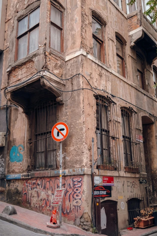 a side street is covered with graffiti and graffiti