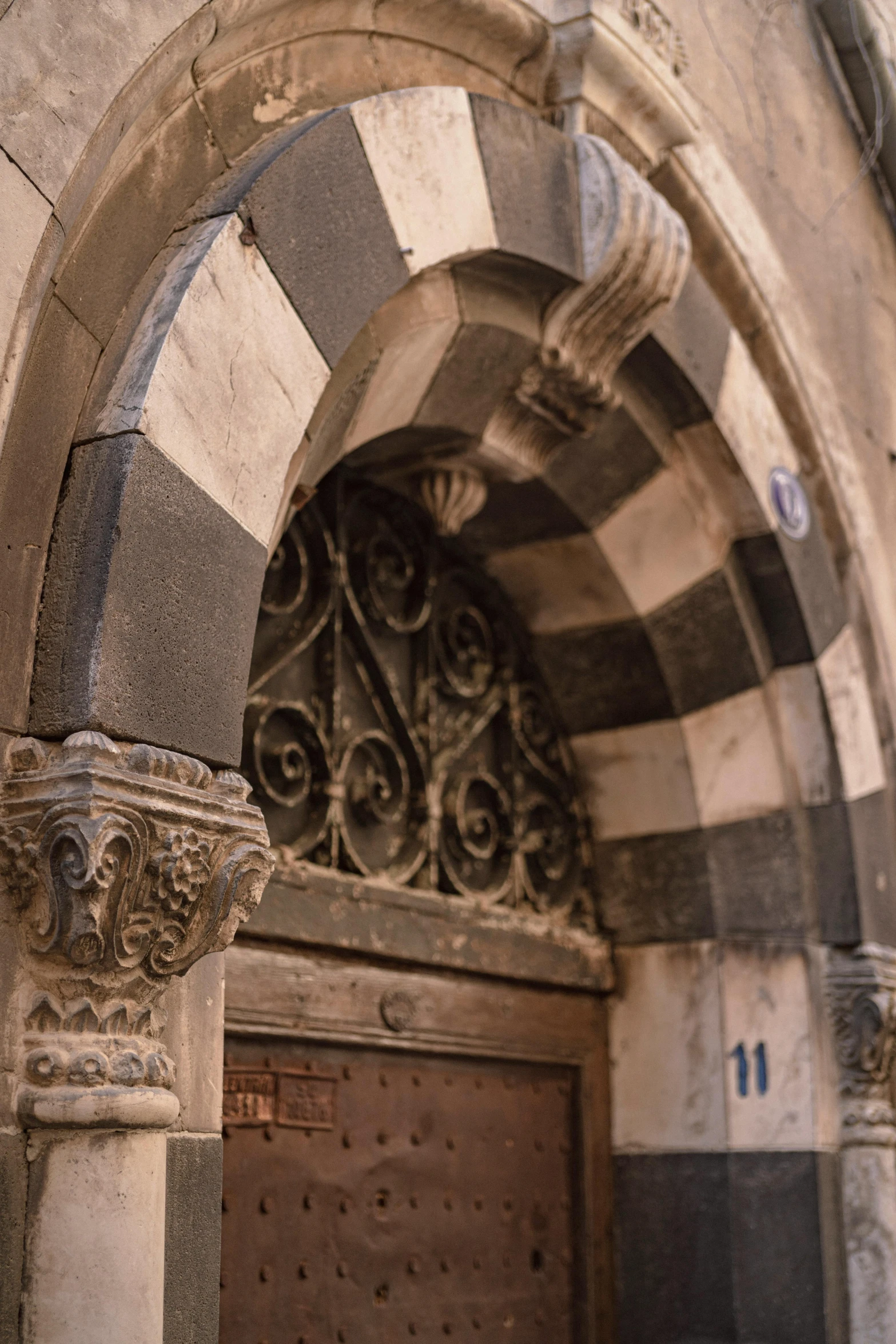 an ornate doorway at an older building