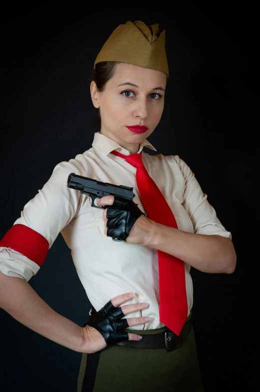 a woman dressed as a doctor who is holding a gun