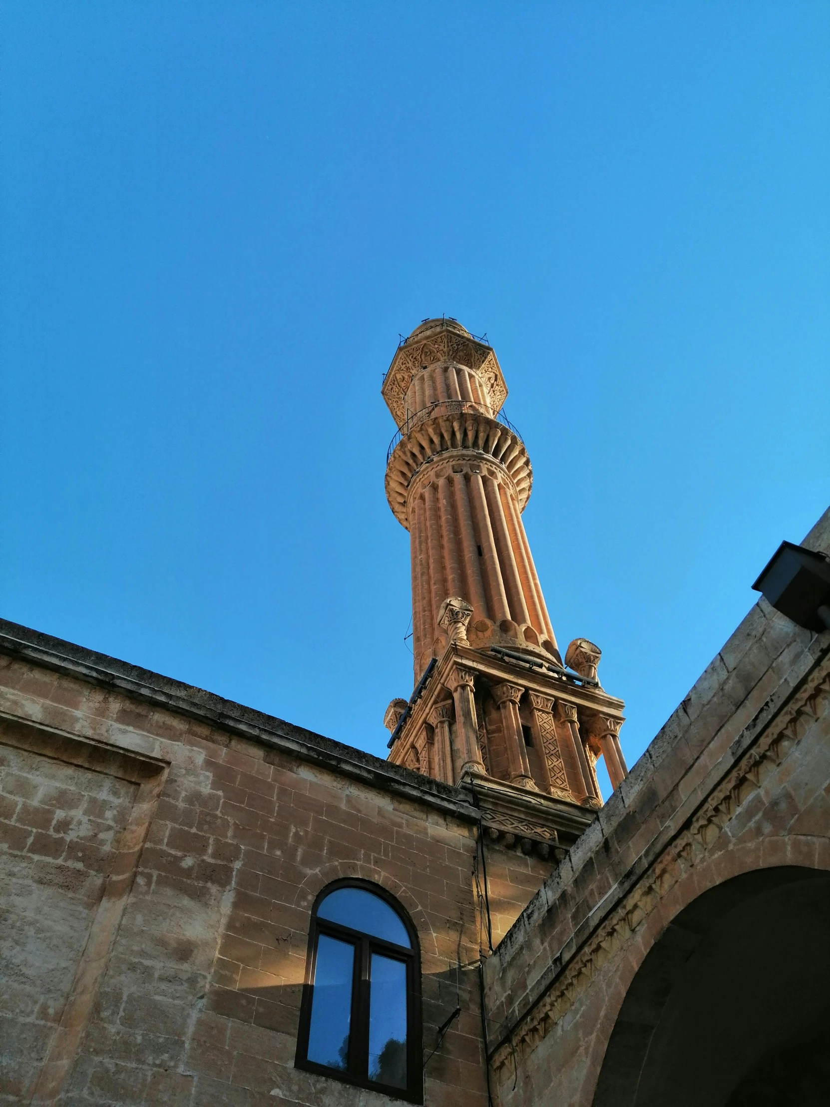 an old stone building with a clock tower