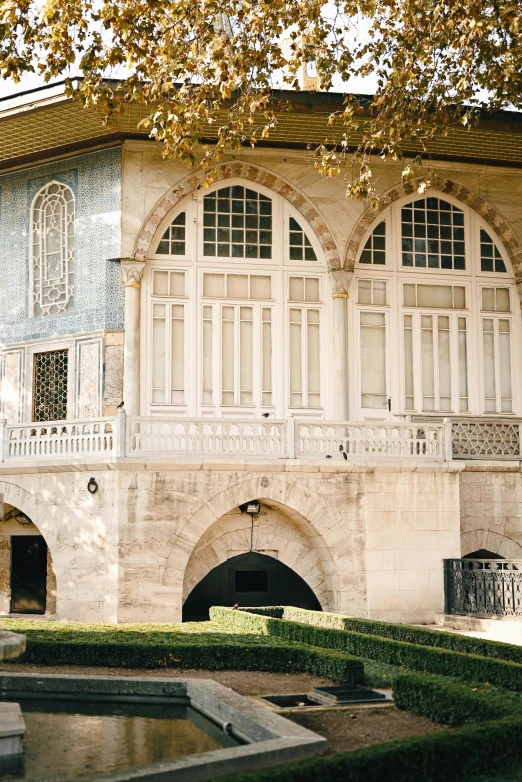 a large building with many windows in front of it