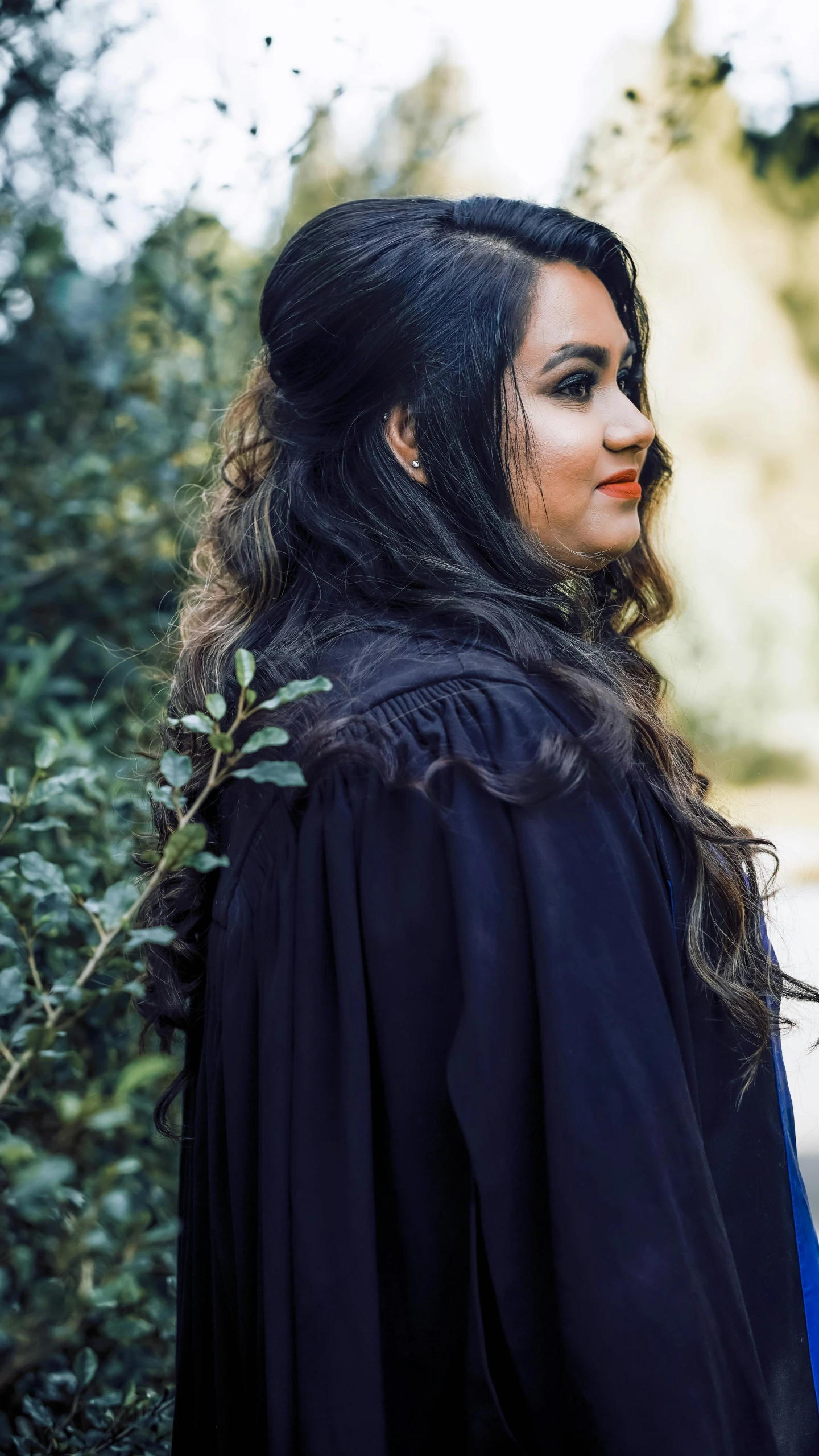 a person standing with a hairdo in a costume